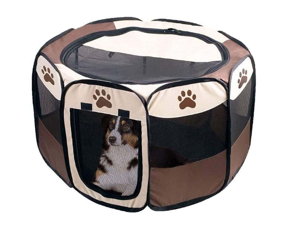 Pet playpen used outdoors on grass