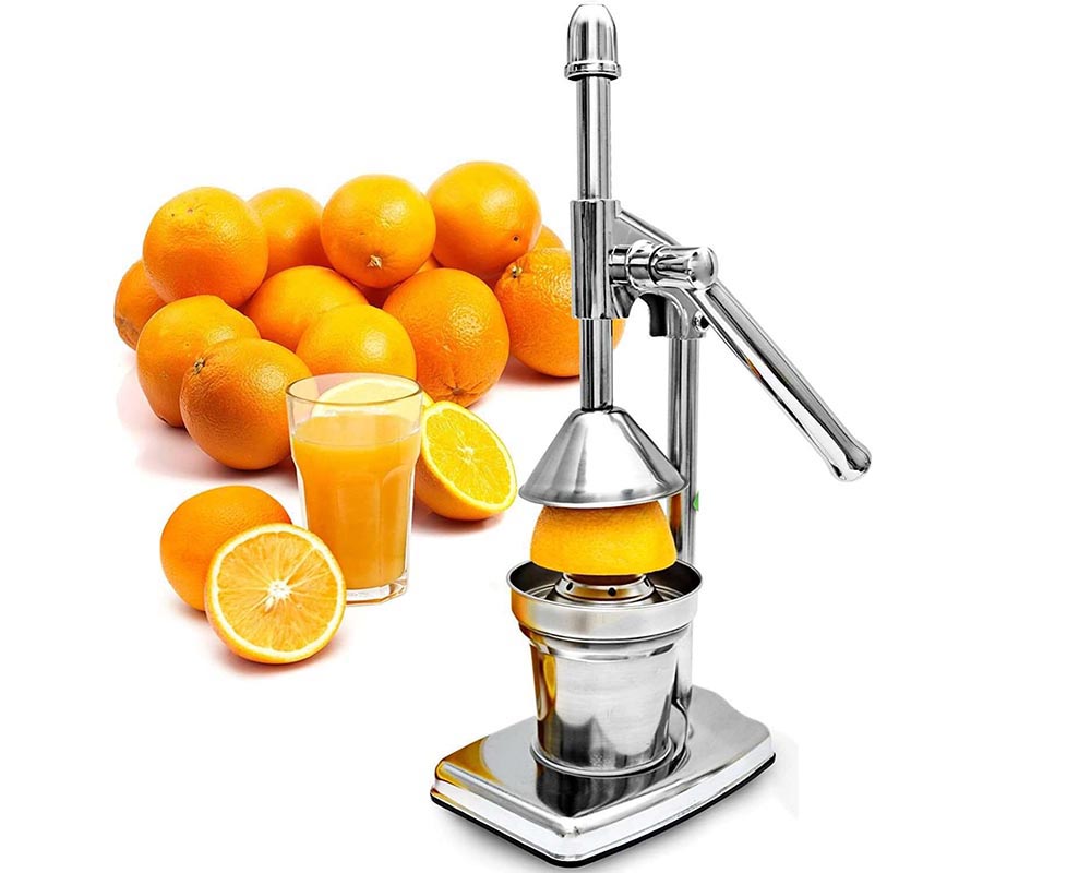 Manual juicer hand press showing compact size