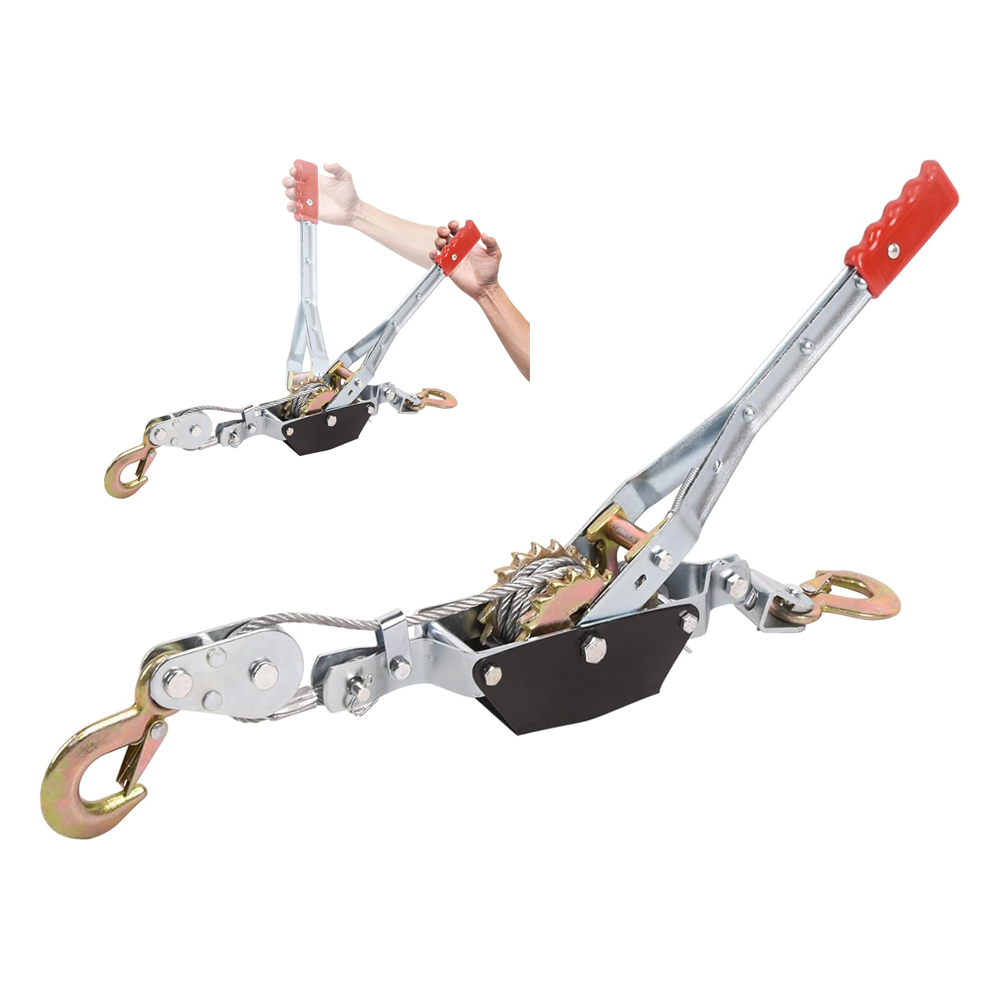 Cable winch power puller in use lifting heavy load outdoors