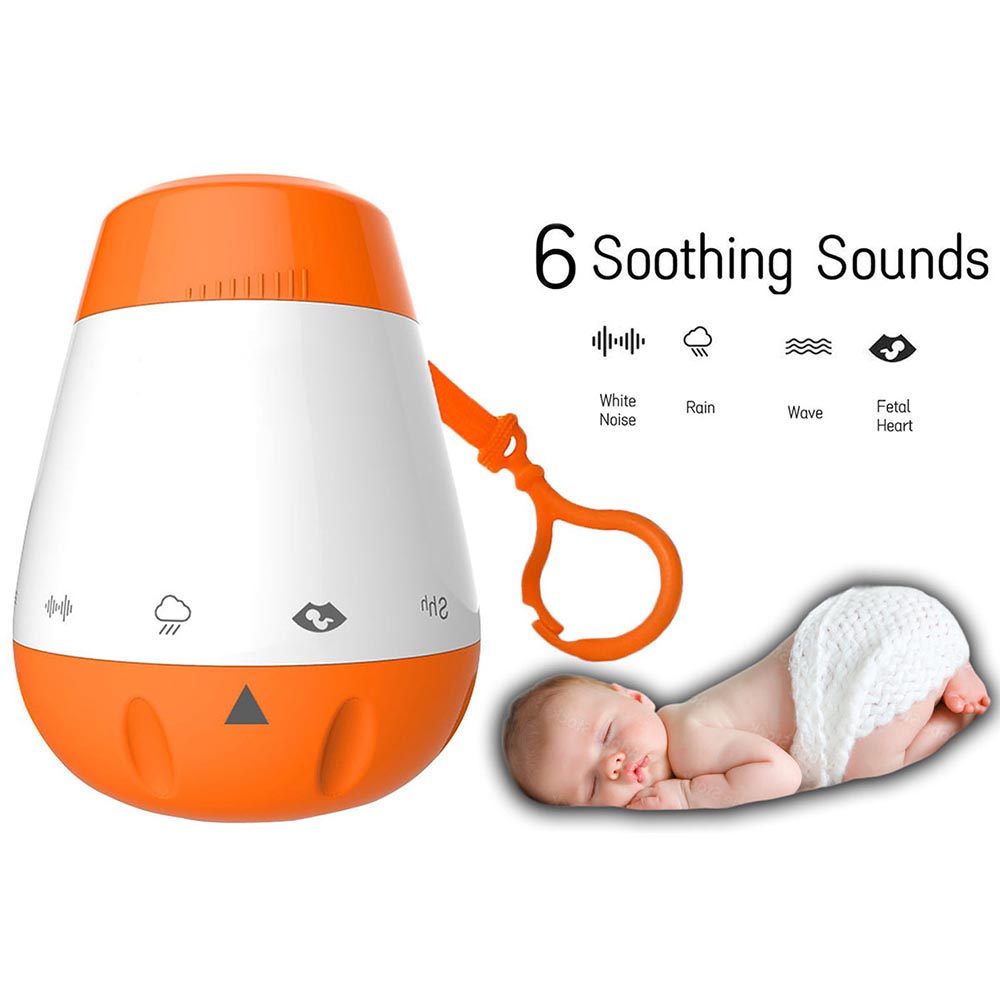 Baby white noise machine in use beside cot