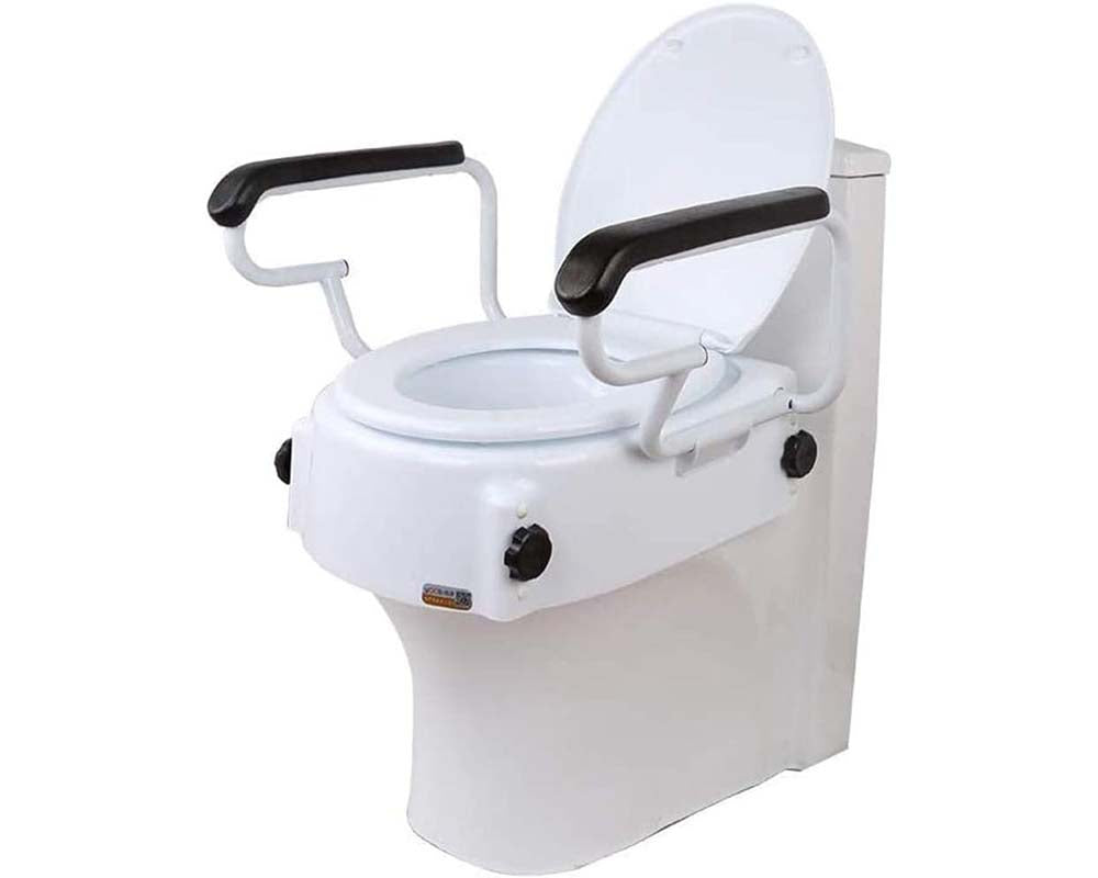 Toilet safety seat showing reversible and detachable design