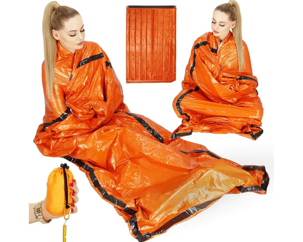 Emergency sleeping bag in outdoor survival kit