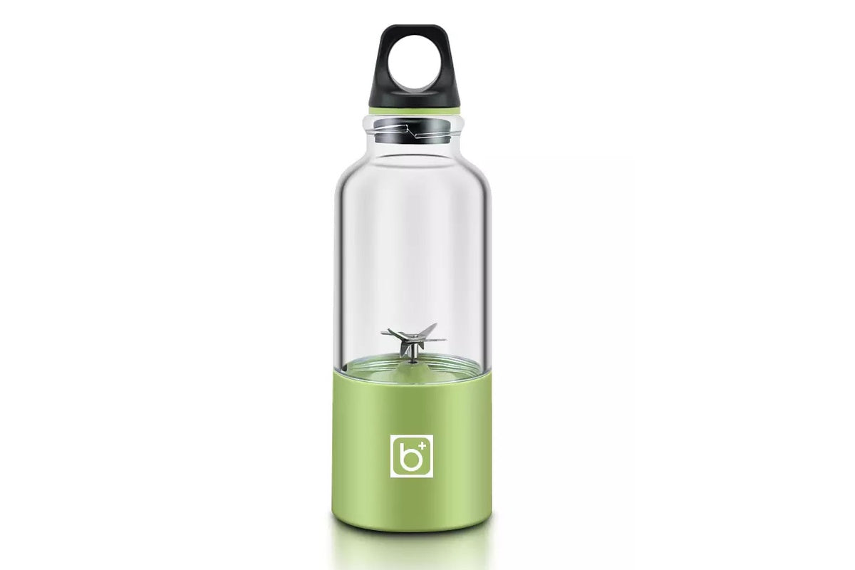 Portable blender placed on kitchen bench