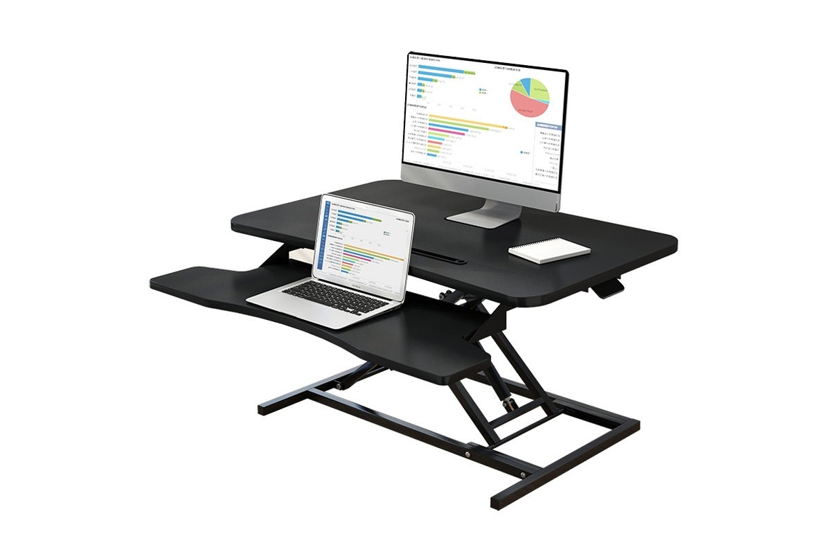 Desk table raised to standing height