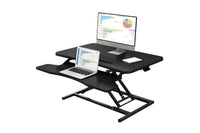 Thumbnail for Desk table raised to standing height