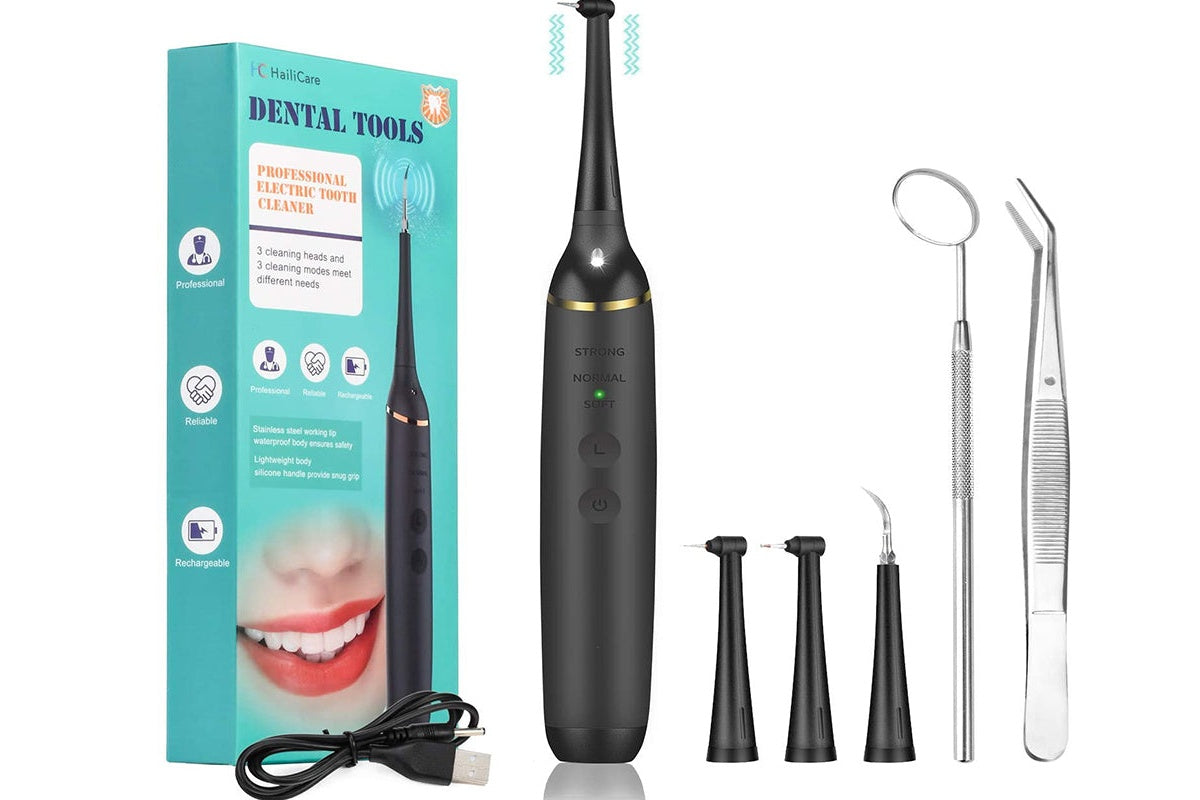 Electric dental cleaner with user manual