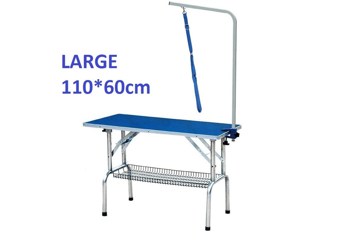 Adjustable grooming arm attached to table