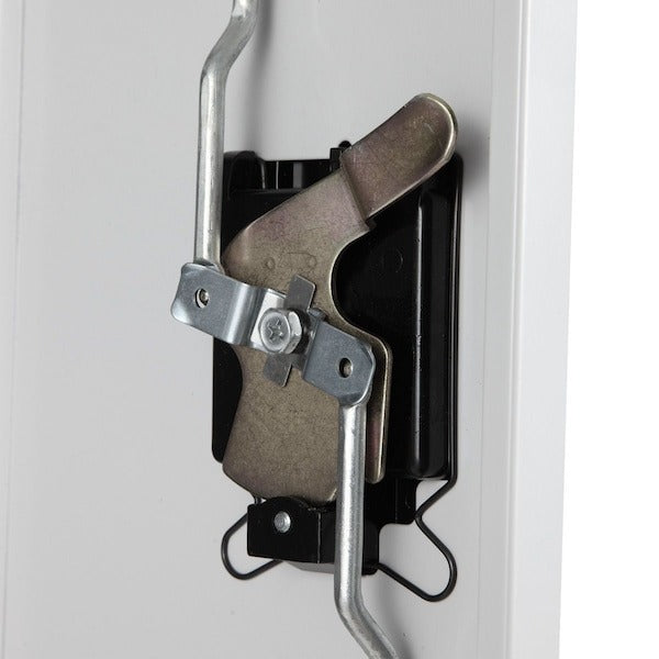 Filing cabinet in office setting with files and supplies