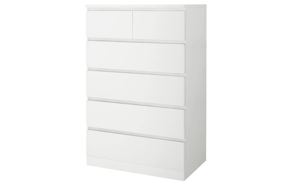Tallboy dresser showing large and half drawers