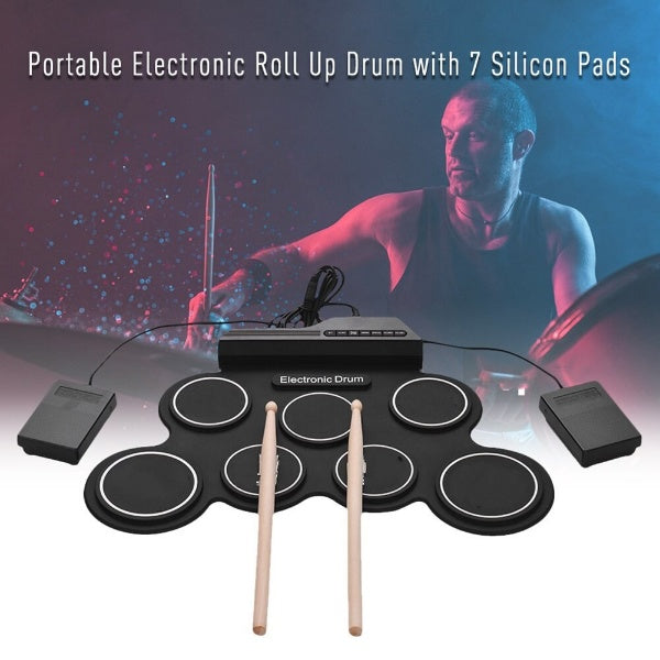 Electronic roll up drum kit showing MP3 input for music