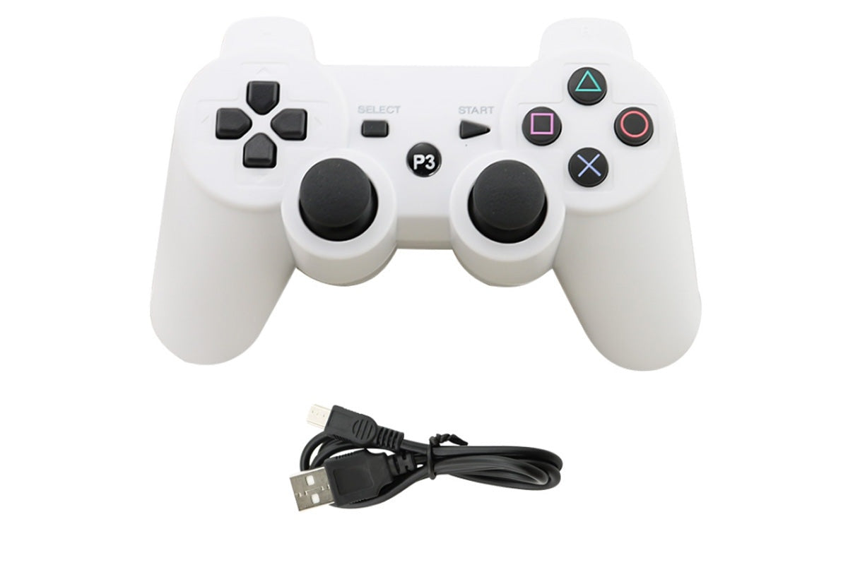 PS3 wireless controller white held in hand for scale