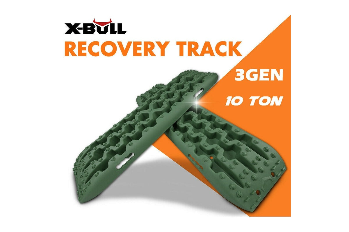 X-BULL recovery tracks laid out flat on gravel