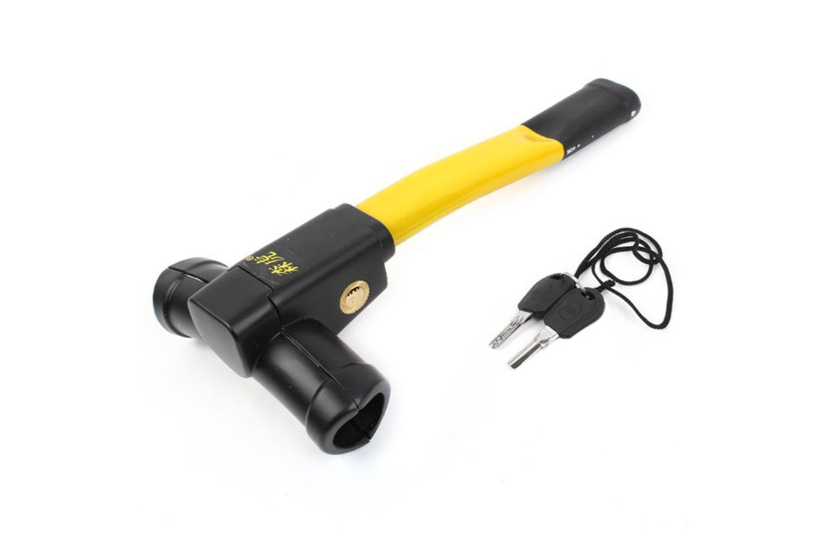 Steering wheel lock installed on car wheel