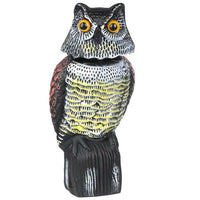 Thumbnail for Owl decoy bird scarer with moveable head in garden
